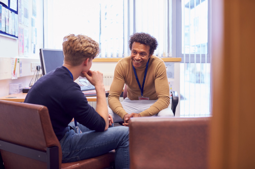 Boy meeting with a counselor